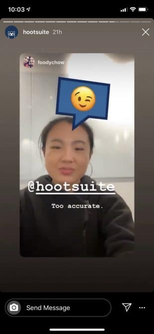 Instagram Story of a woman using Hootsuite's AR filter, Emoji Roulette
