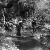 Men at River 